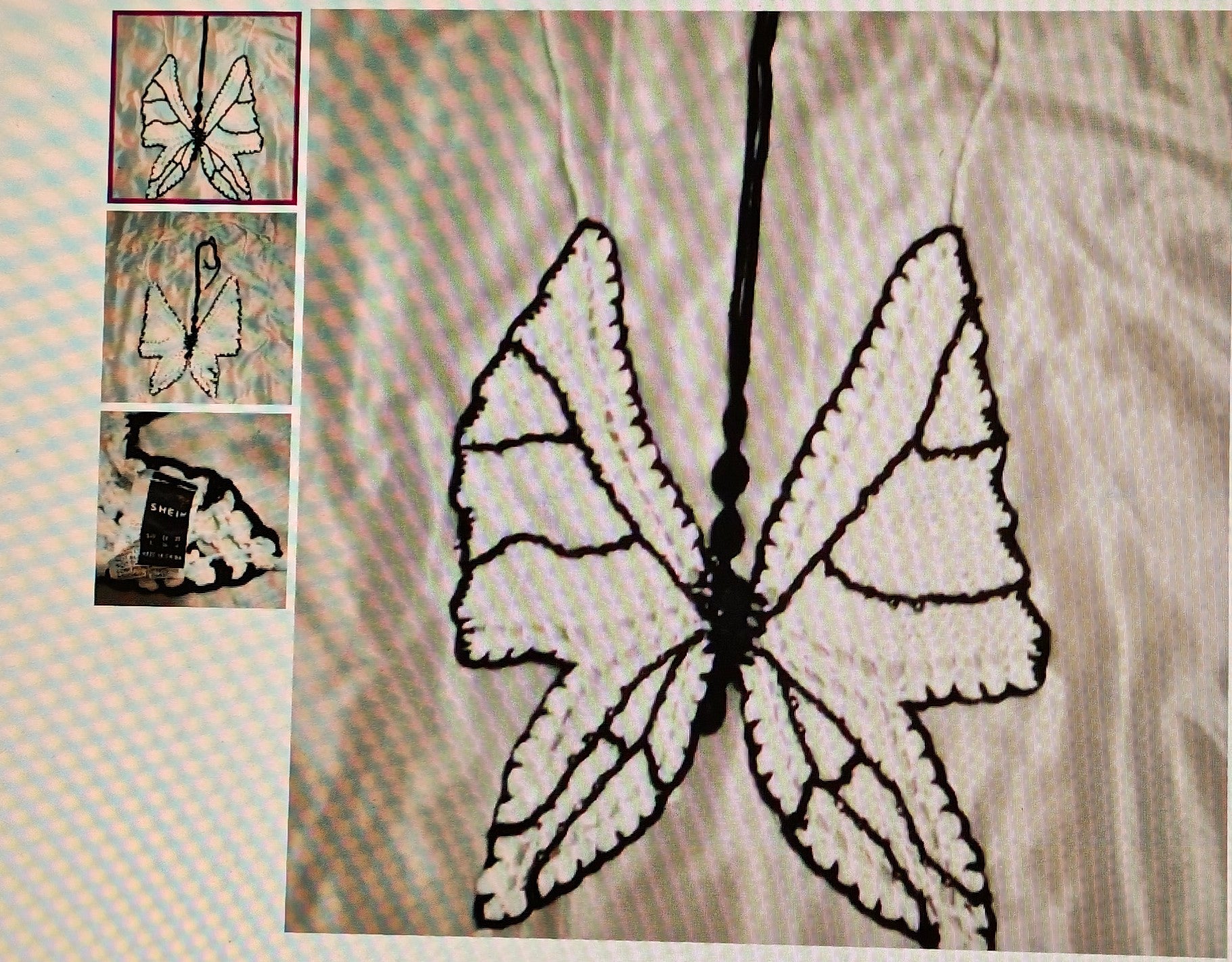 Butterfly design embroidered on fabric with close-up insets showing details.
