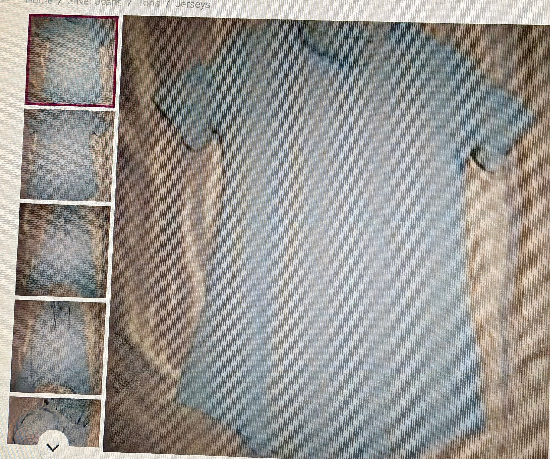 Light blue t-shirt on a textured surface with inset images showing different angles.