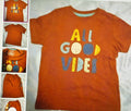 Orange t-shirt with 'All Good Vibes' text on a white background