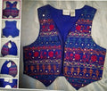 Blue embroidered vest with patterns on a light gray background