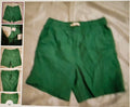 Green shorts on a beige surface with inset images showing different angles.