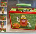 Vintage lunchbox with 'Mrs. Potato Head' design on a textured surface.
