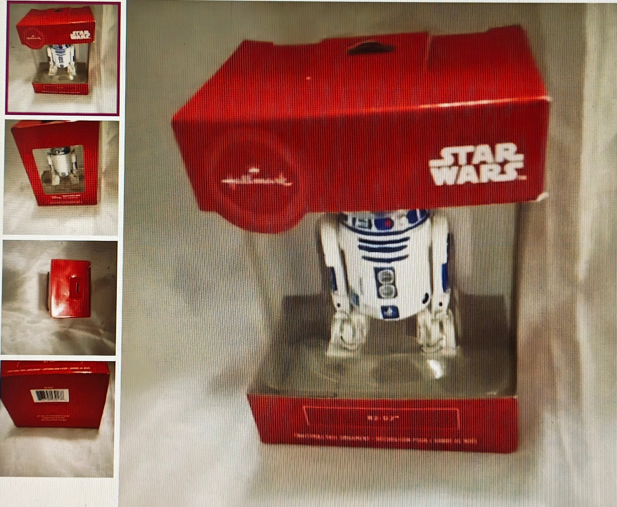 Star Wars R2-D2 toy figure in a red box on a light gray background