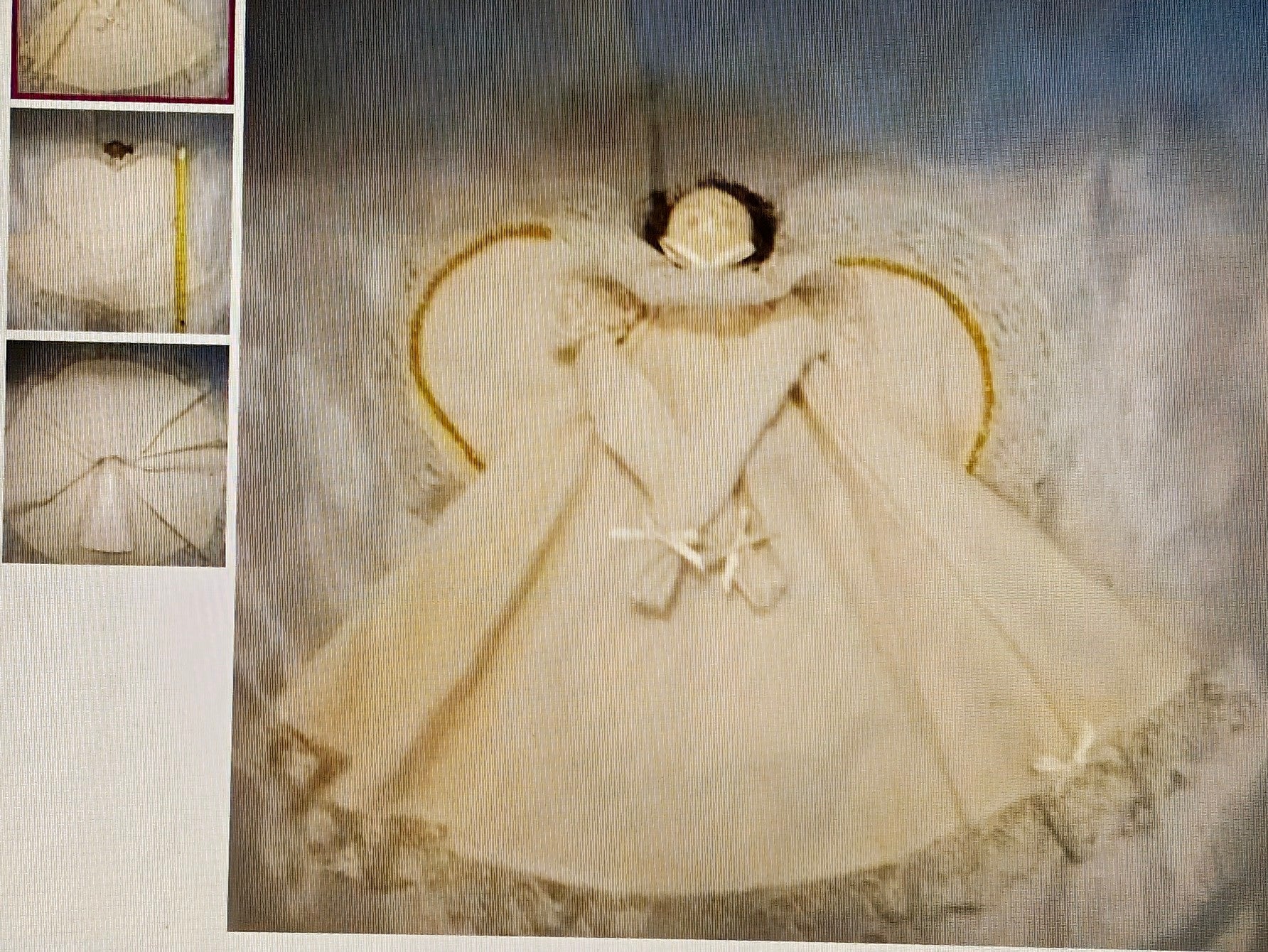 Decorative angel figure with a star on a textured background