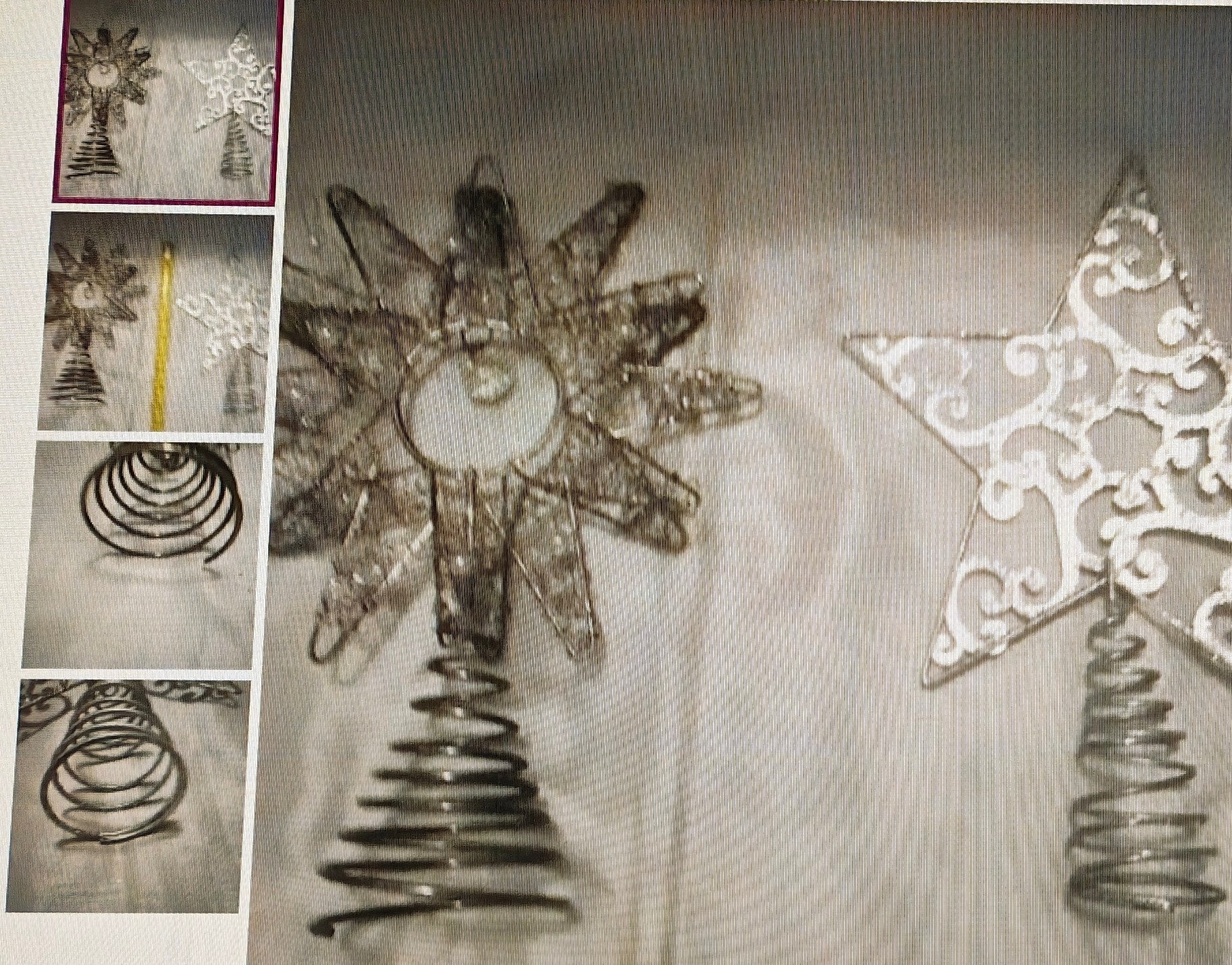 Decorative metal tree and star ornaments on a white background