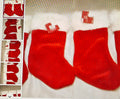 New 4 Christmas stockings red/white 14"H 7"W Christmas in July decorative event
