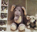 Stuffed elephant toys on a textured surface with smaller images of the same toy on the left.