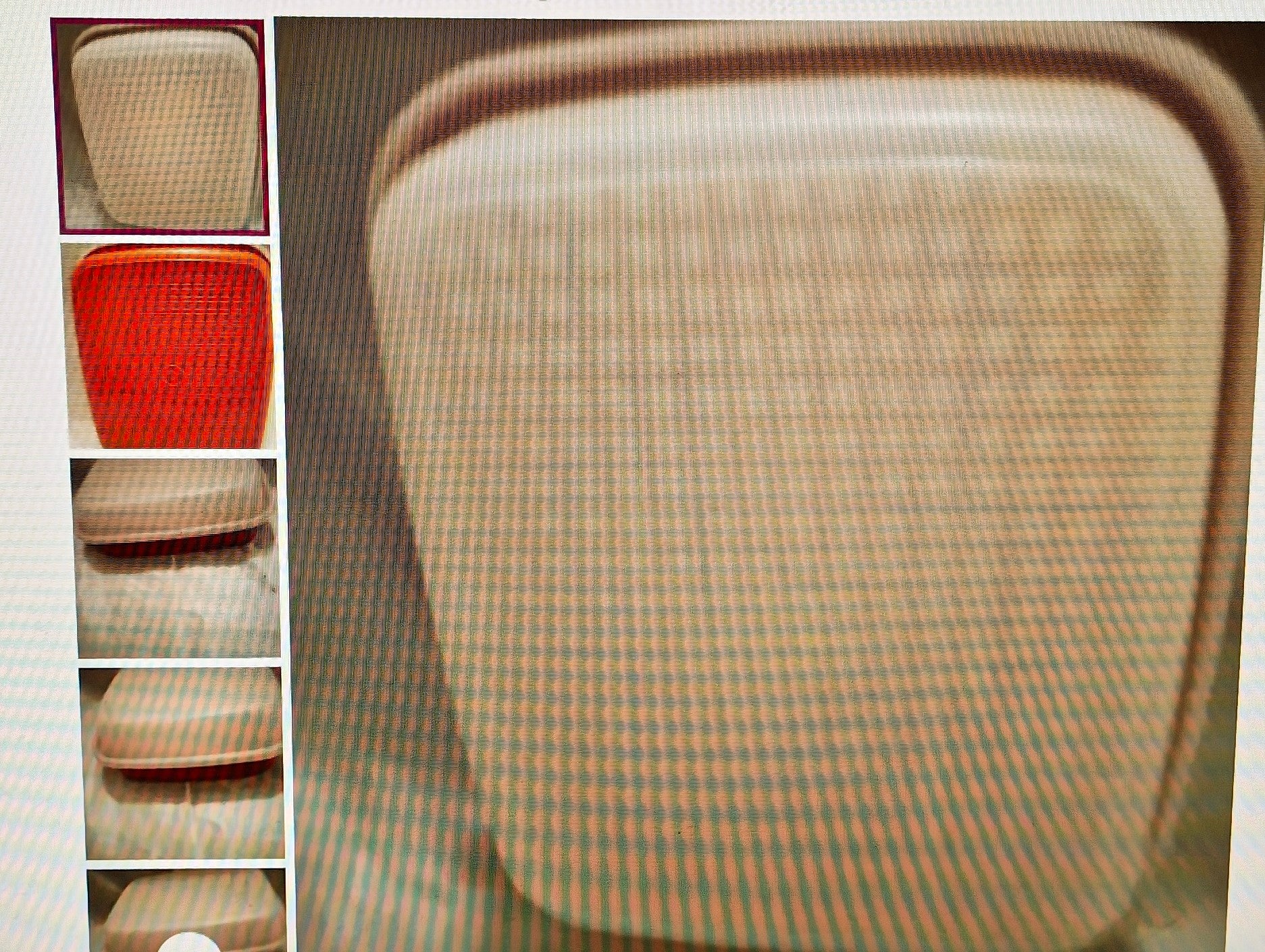 Close-up of a woven seat cover with color swatches on the side.