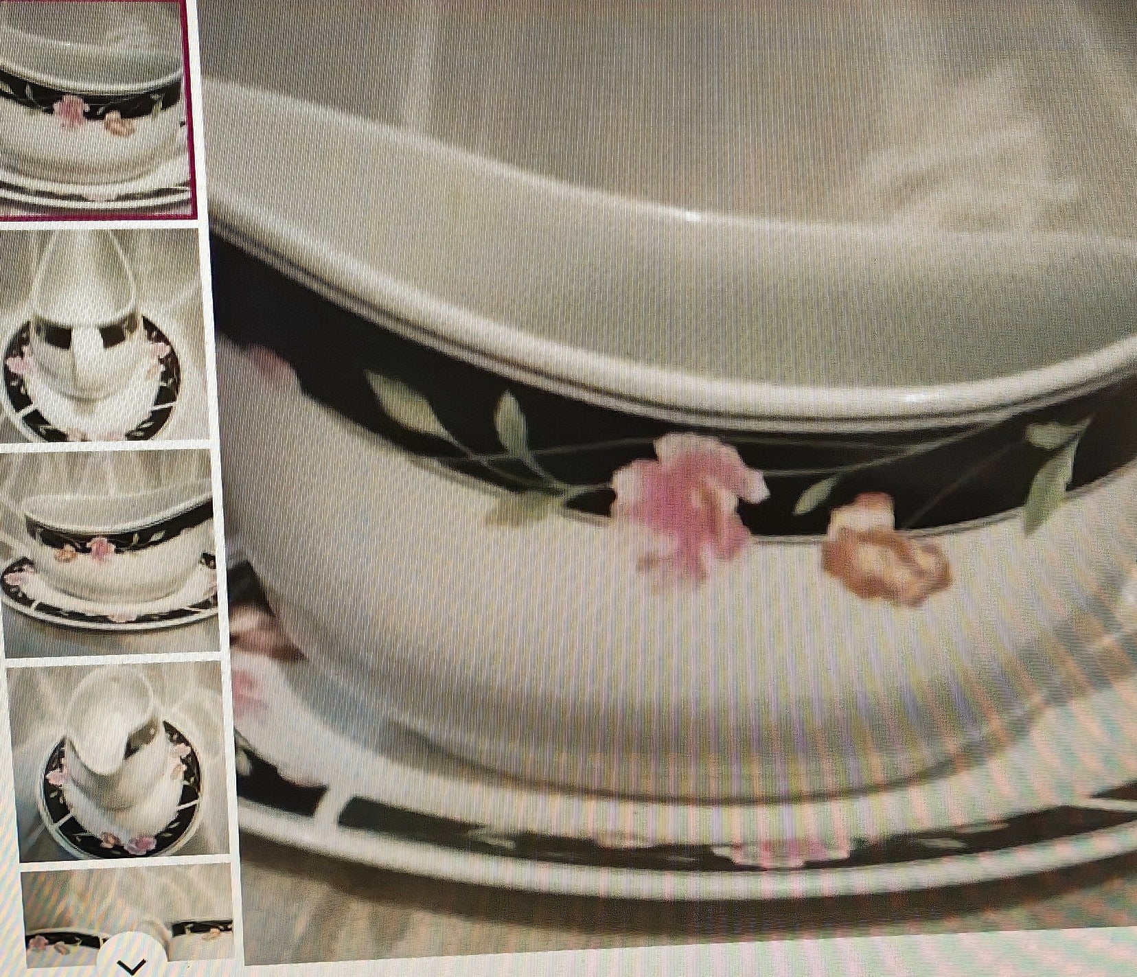 Decorative ceramic bowl with floral design on a textured surface