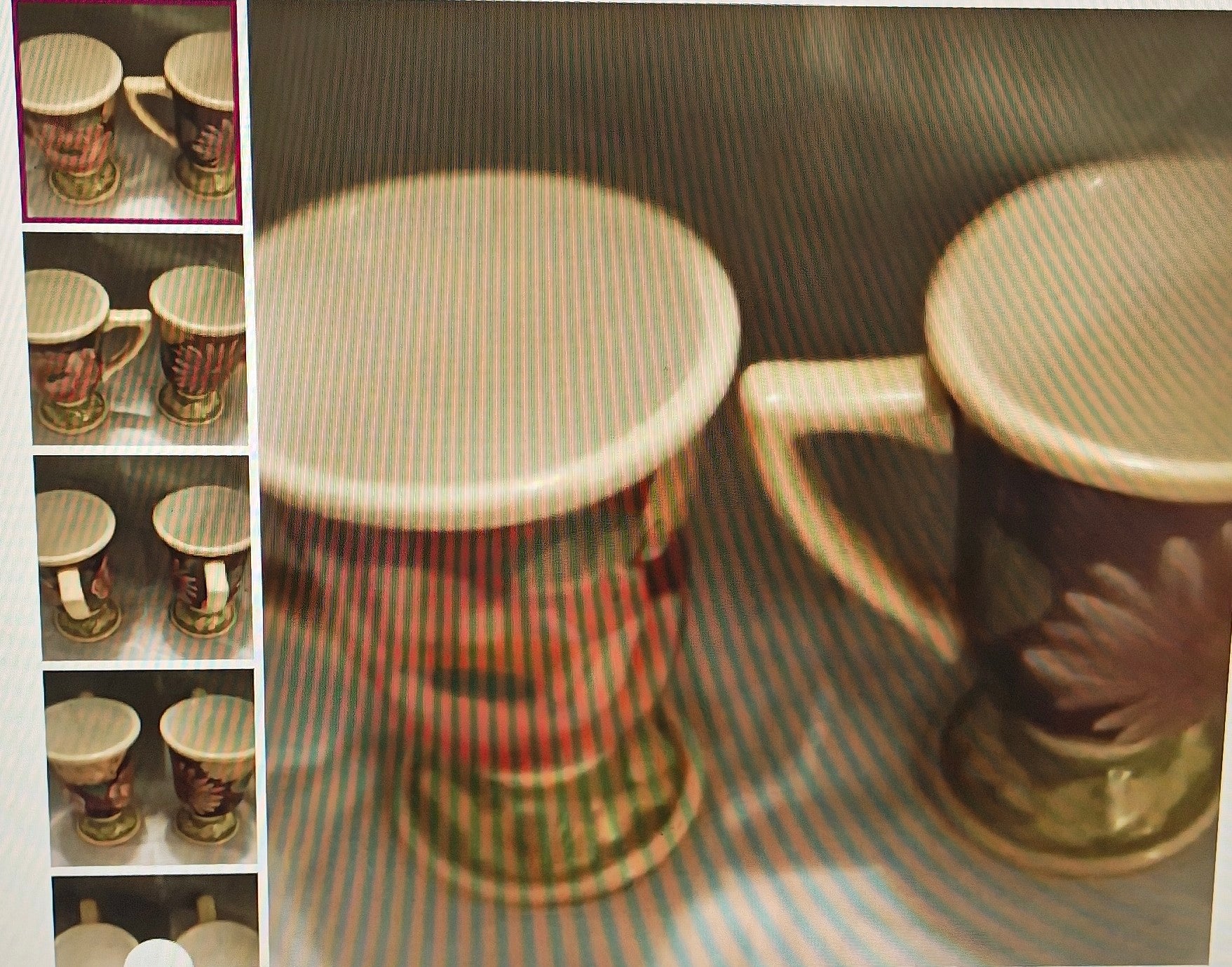 Ceramic mug with decorative patterns on a textured surface