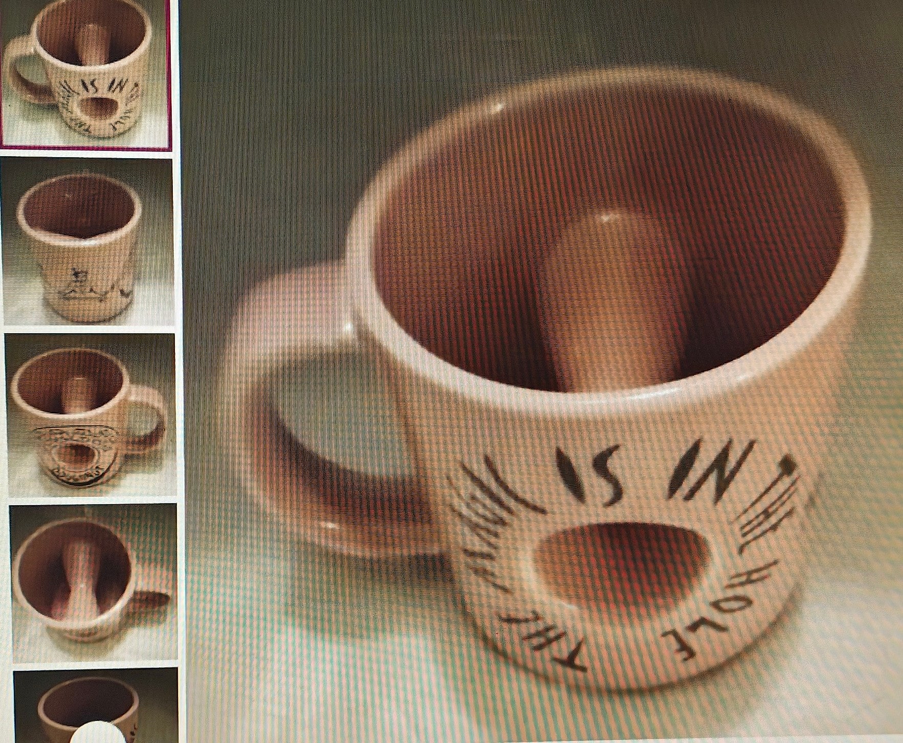 Ceramic mug with a handle and text on a textured surface