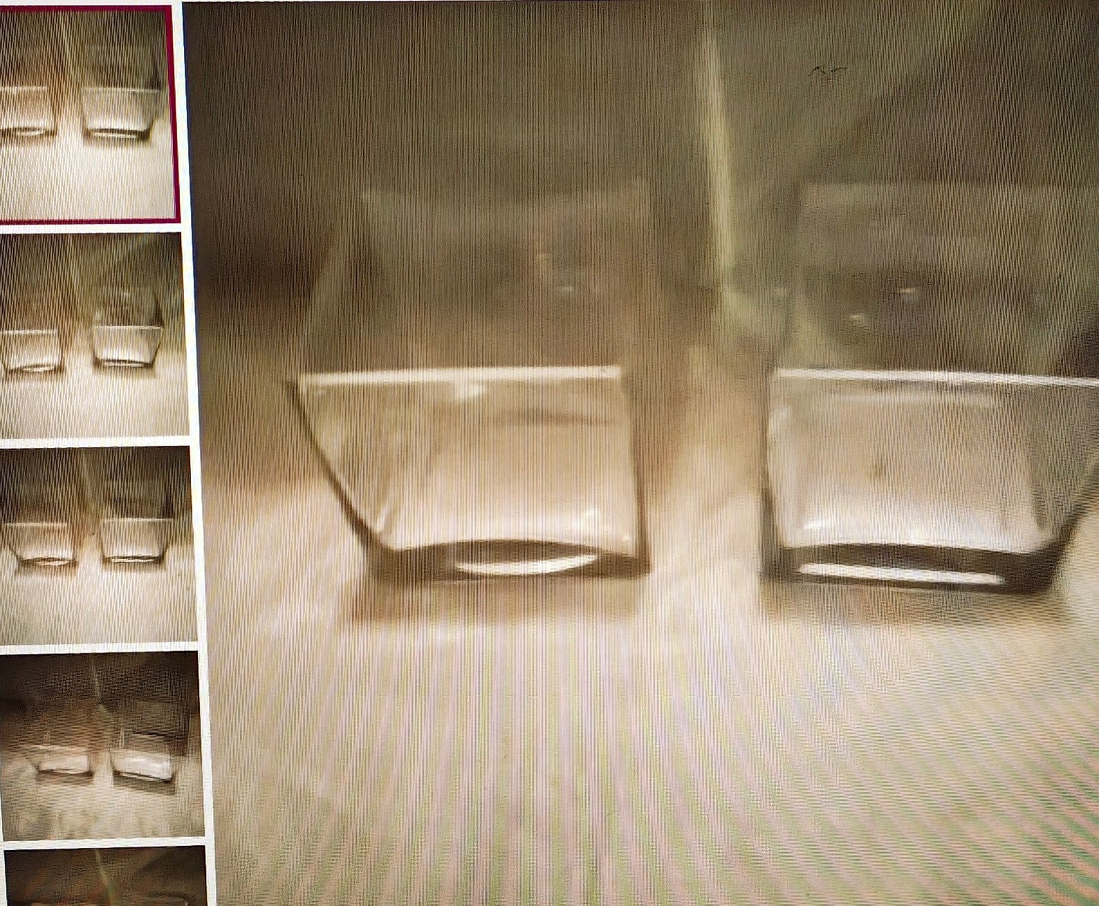 Set of clear glass containers on a textured surface