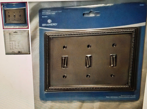 Metallic switch plate with Brainerd logo on a blue protective sheet
