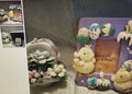Decorative photo frame with cartoon character design on a textured surface.