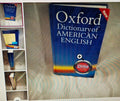 Oxford Dictionary of American English on a striped surface
