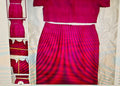 Red patterned outfit displayed on a white background