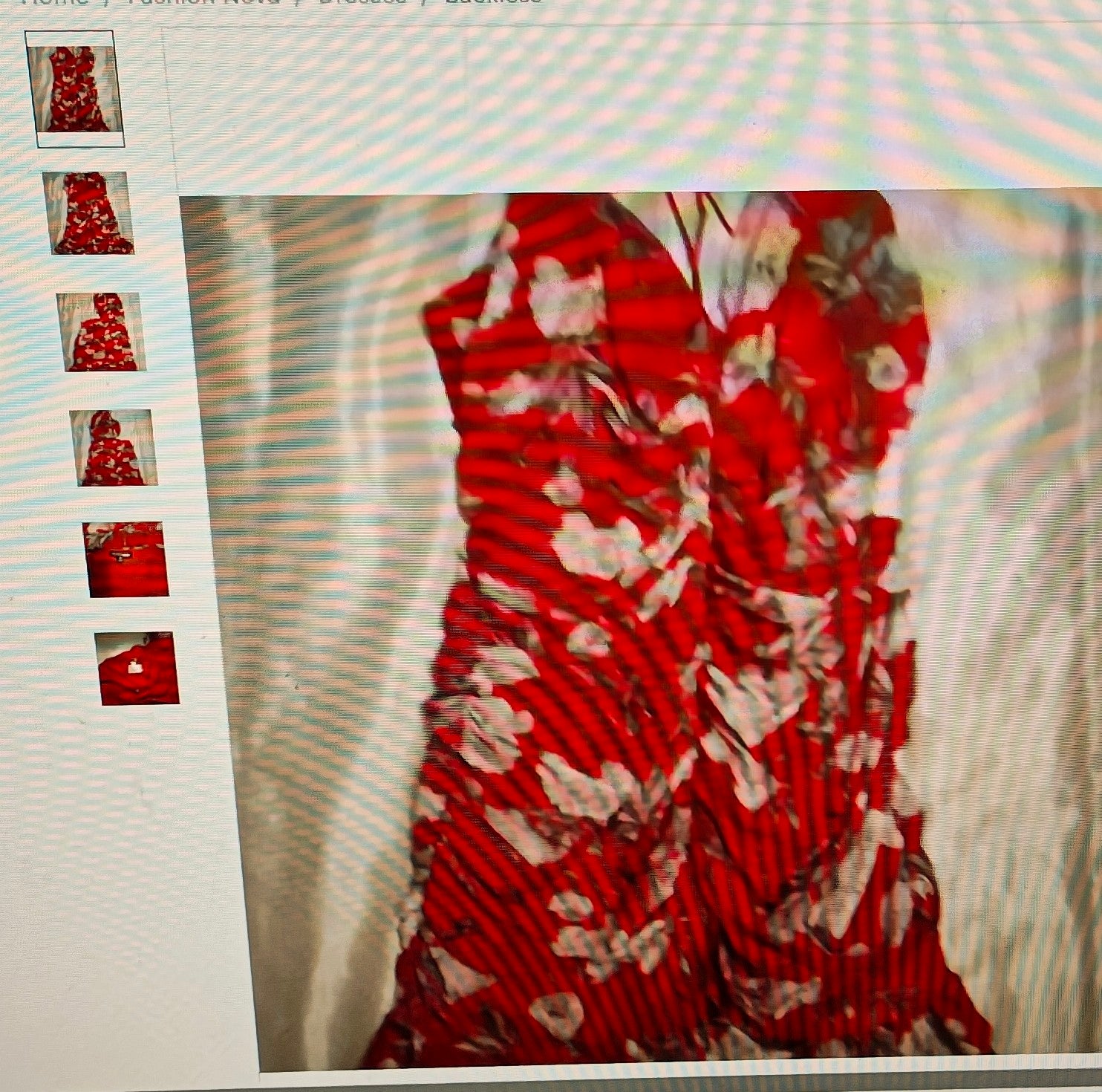 Red floral dress with a blurred background