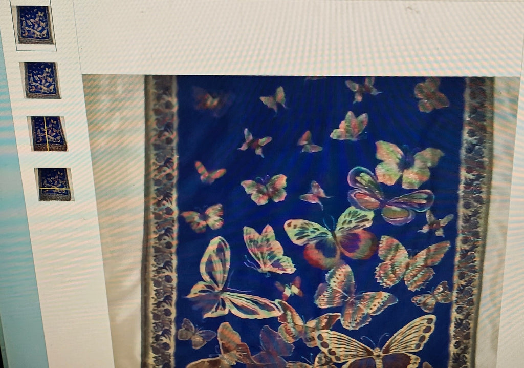 Scarf with butterfly pattern on a blue background