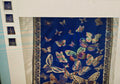 Scarf with butterfly pattern on a blue background