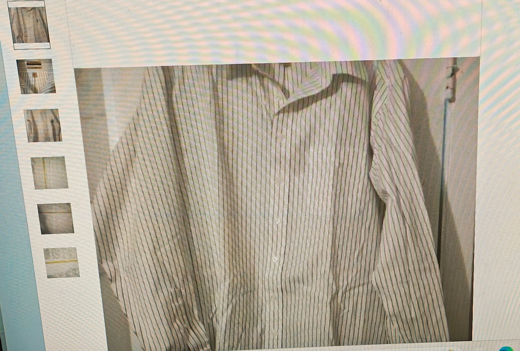 Close-up of a striped shirt with a blurred background