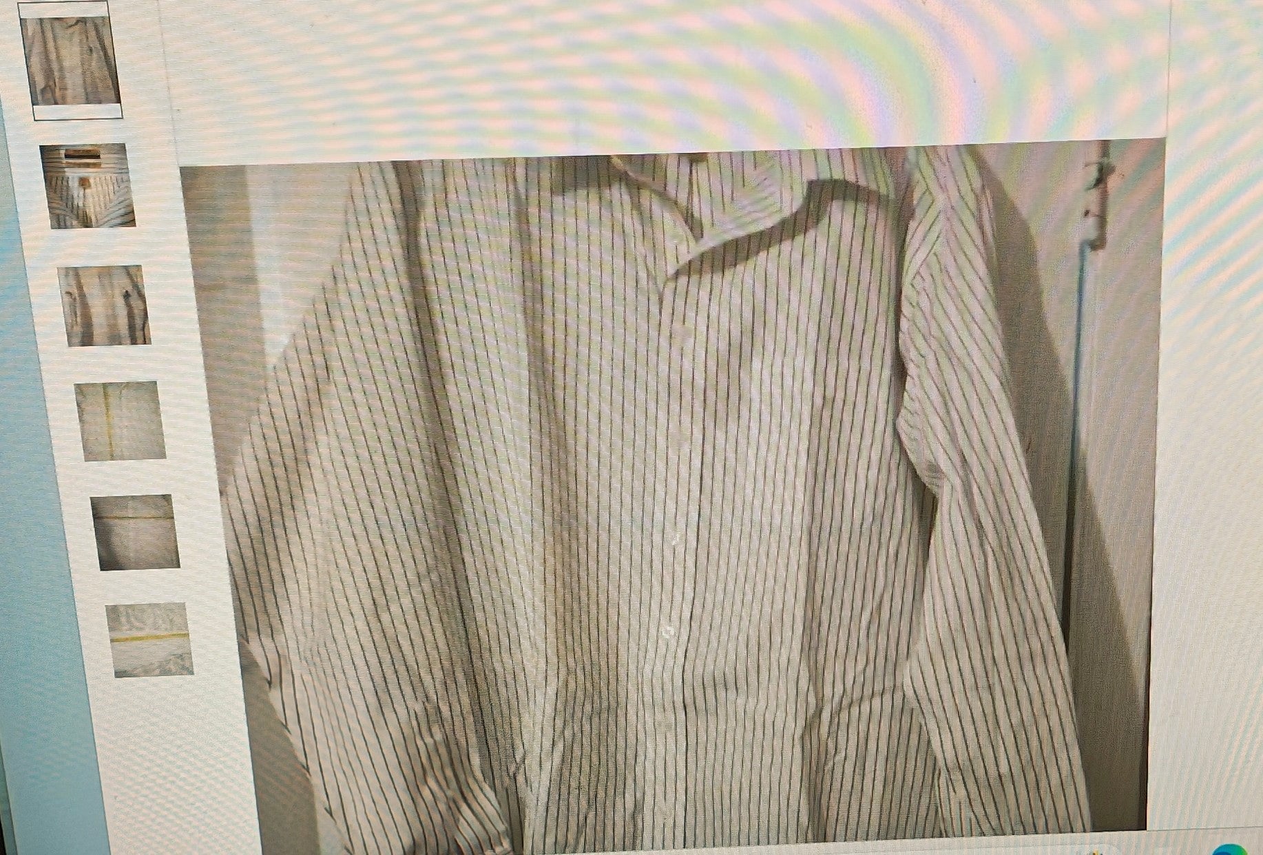 Close-up of a striped shirt with a blurred background