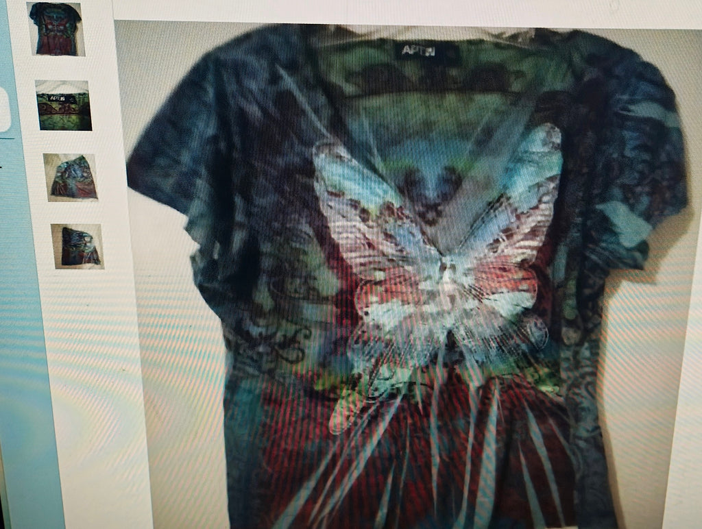 Tie-dye t-shirt with butterfly design on a plain background