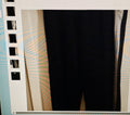 Close-up of a black fabric with a textured background