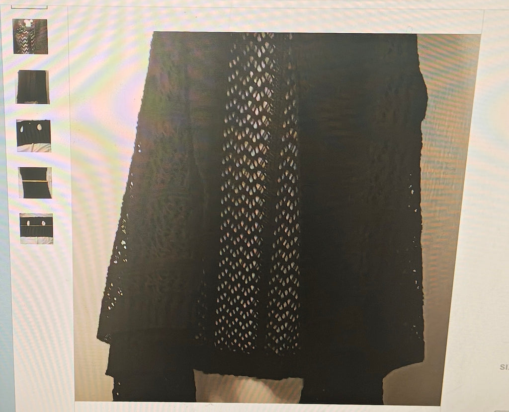 Black lace garment on a white background