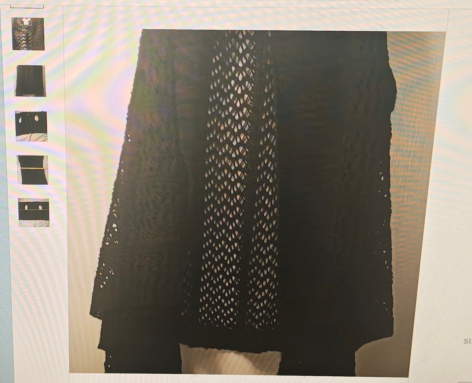 Black lace garment on a white background