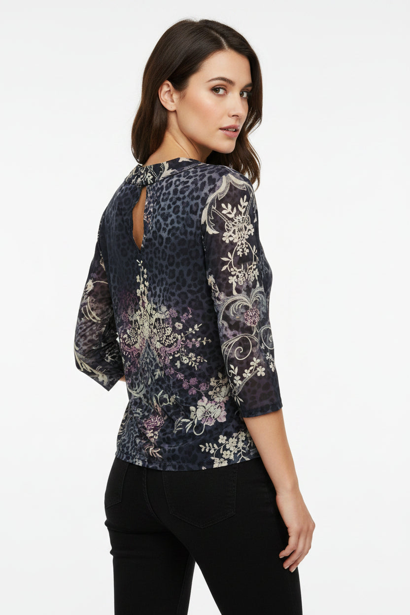 Black floral-patterned garment on a white background