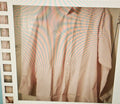 Striped shirt with a film strip border