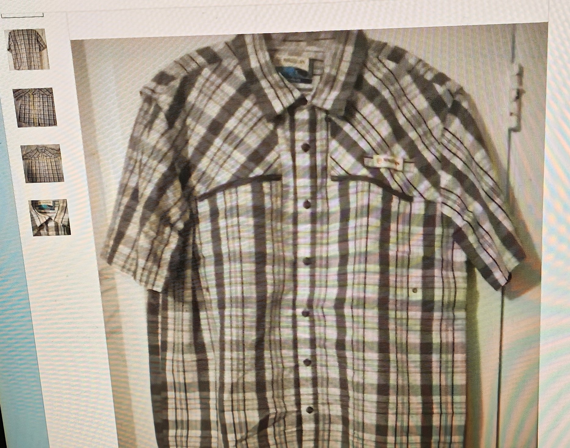 Plaid shirt with short sleeves on a light background