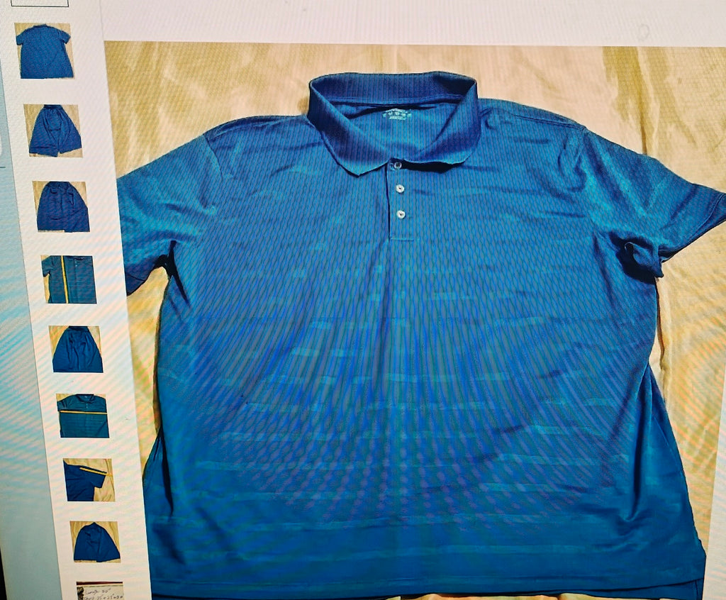 Blue polo shirt with a pattern on a beige surface