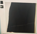 Black skirt on a mannequin against a white background