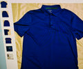 Blue polo shirt on a yellow surface with a ladder in the background