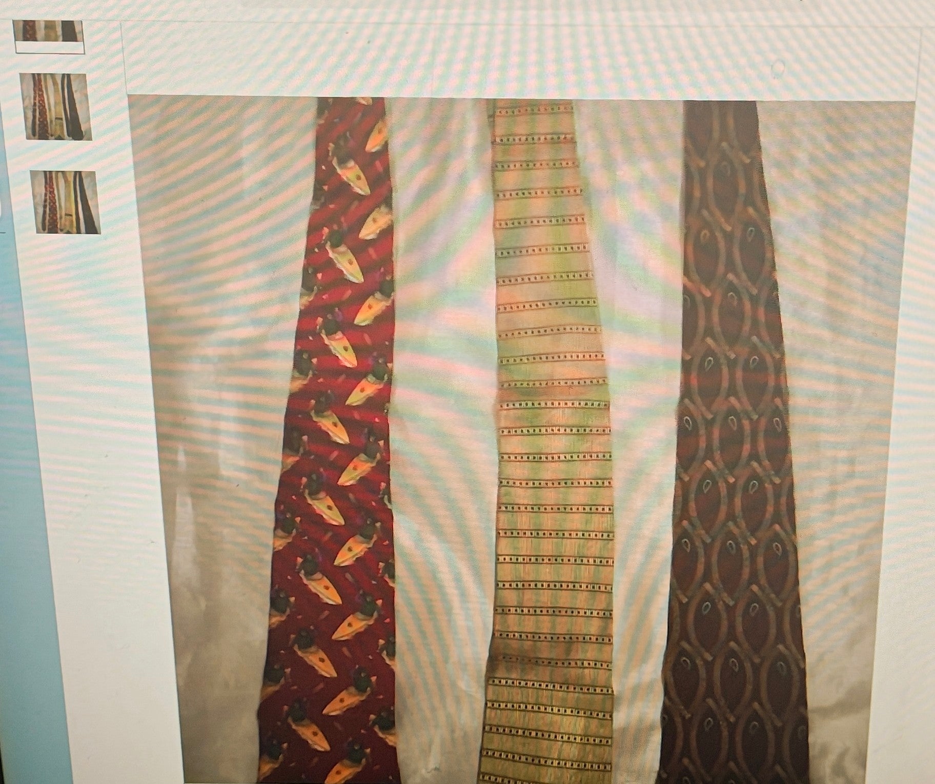 Three patterned ties displayed on a white background