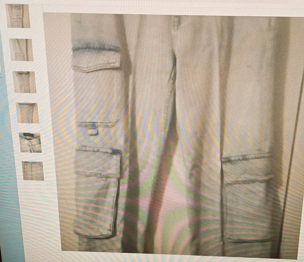 Beige pants with multiple pockets displayed on a white background