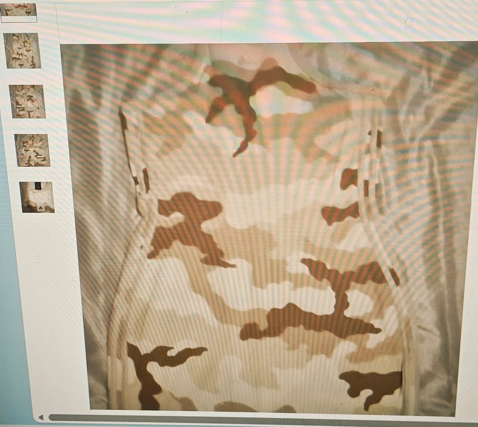 Camouflage pattern on a fabric with a close-up of the texture.