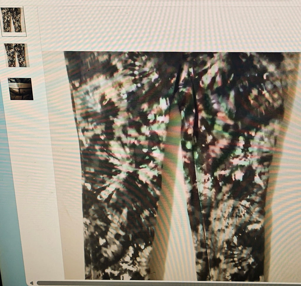 Camouflage-patterned pants on a white background with small images above