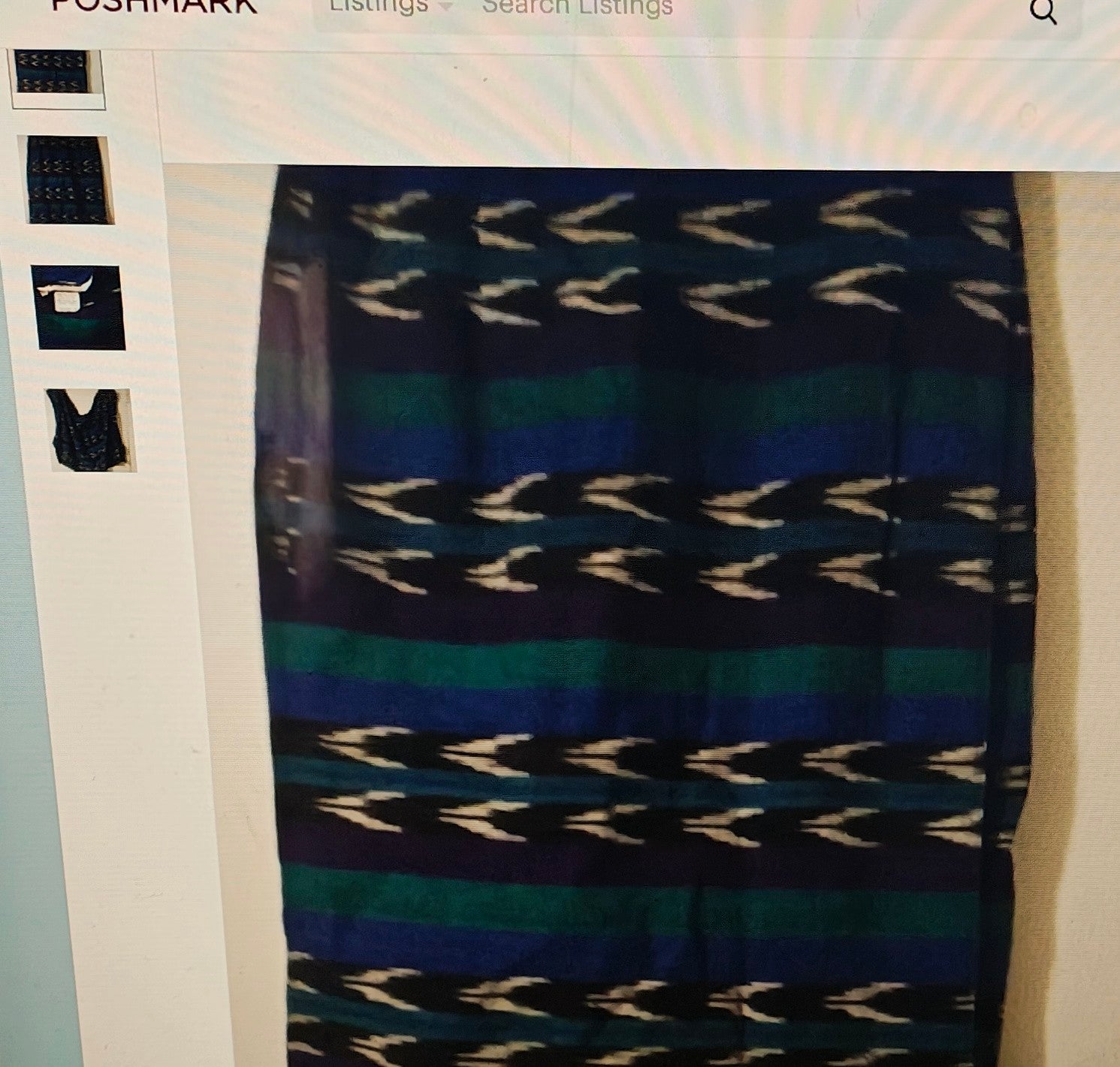 Patterned skirt with blue and black design on a white background