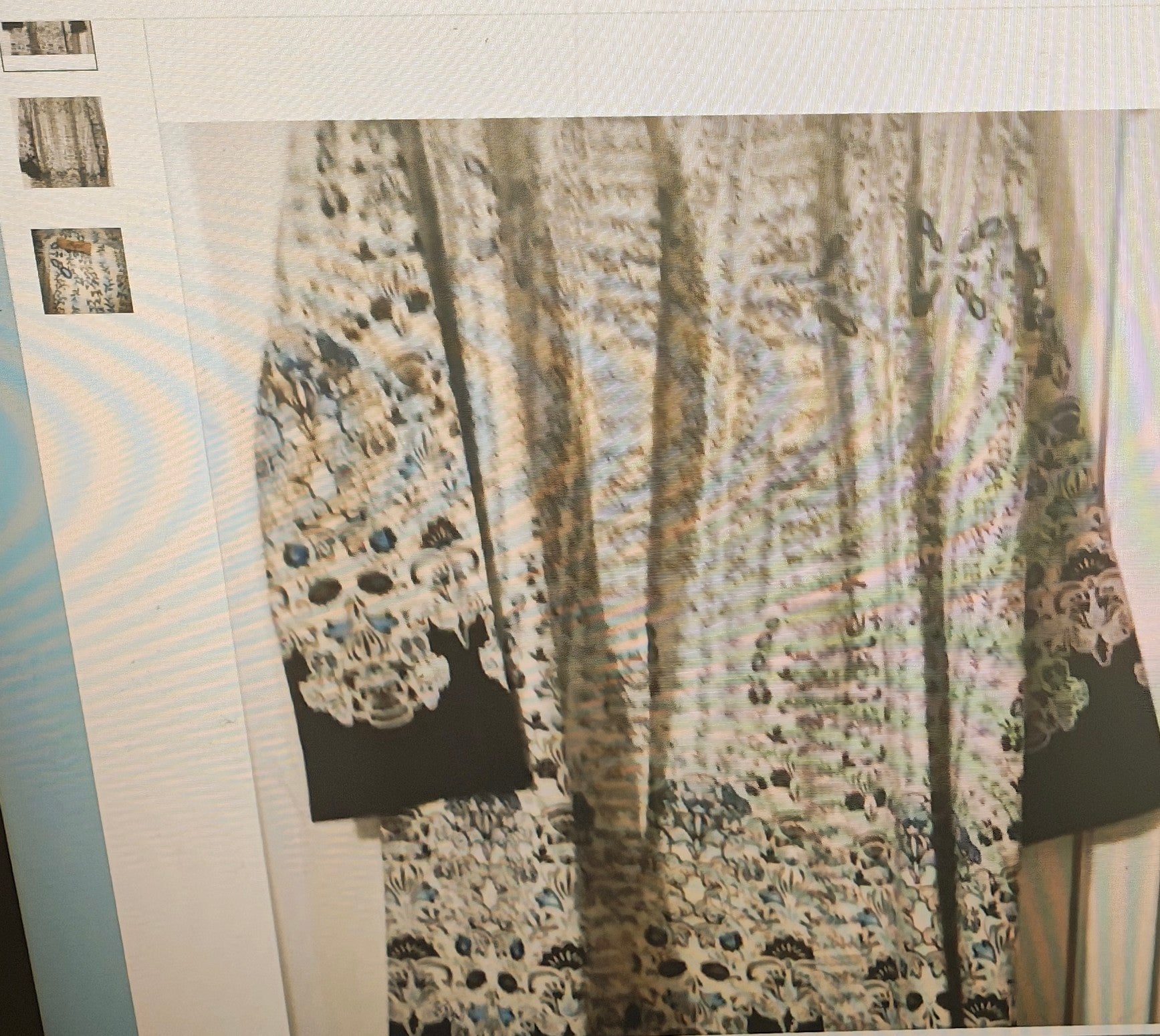 Close-up of a patterned fabric with a neutral color palette.
