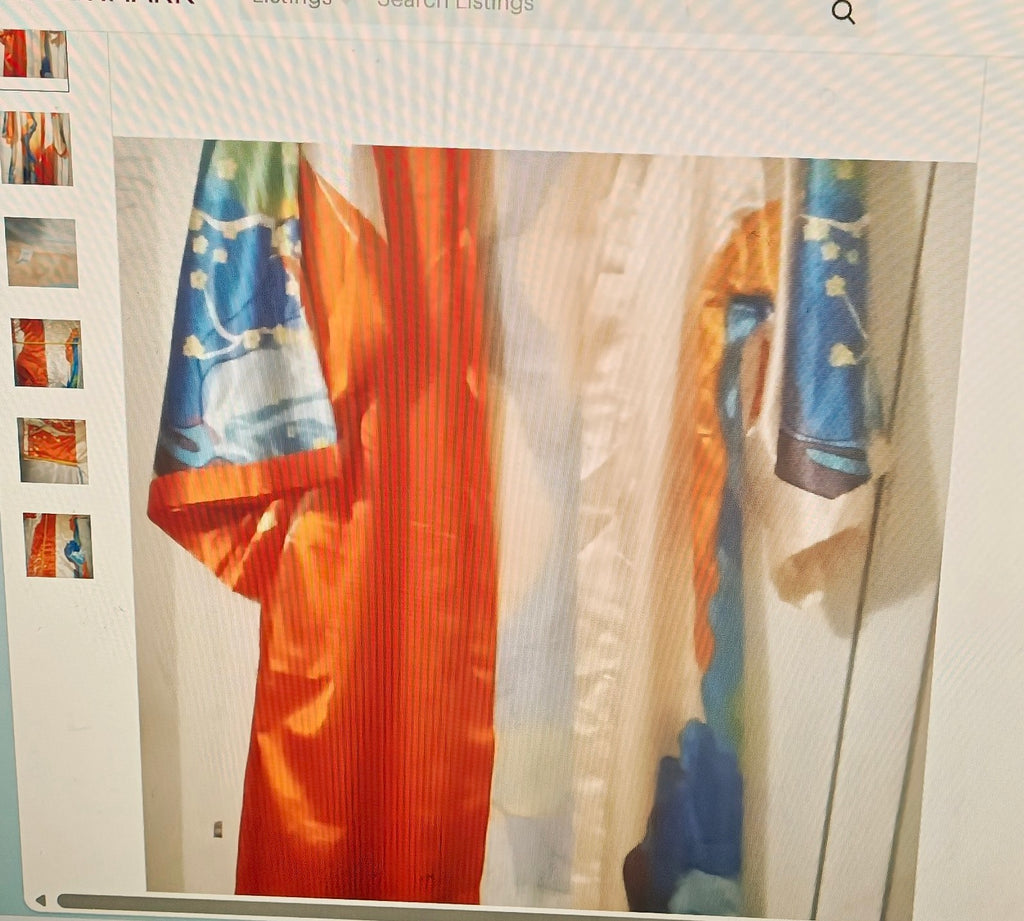 Colorful fabric draped over a chair with a neutral background
