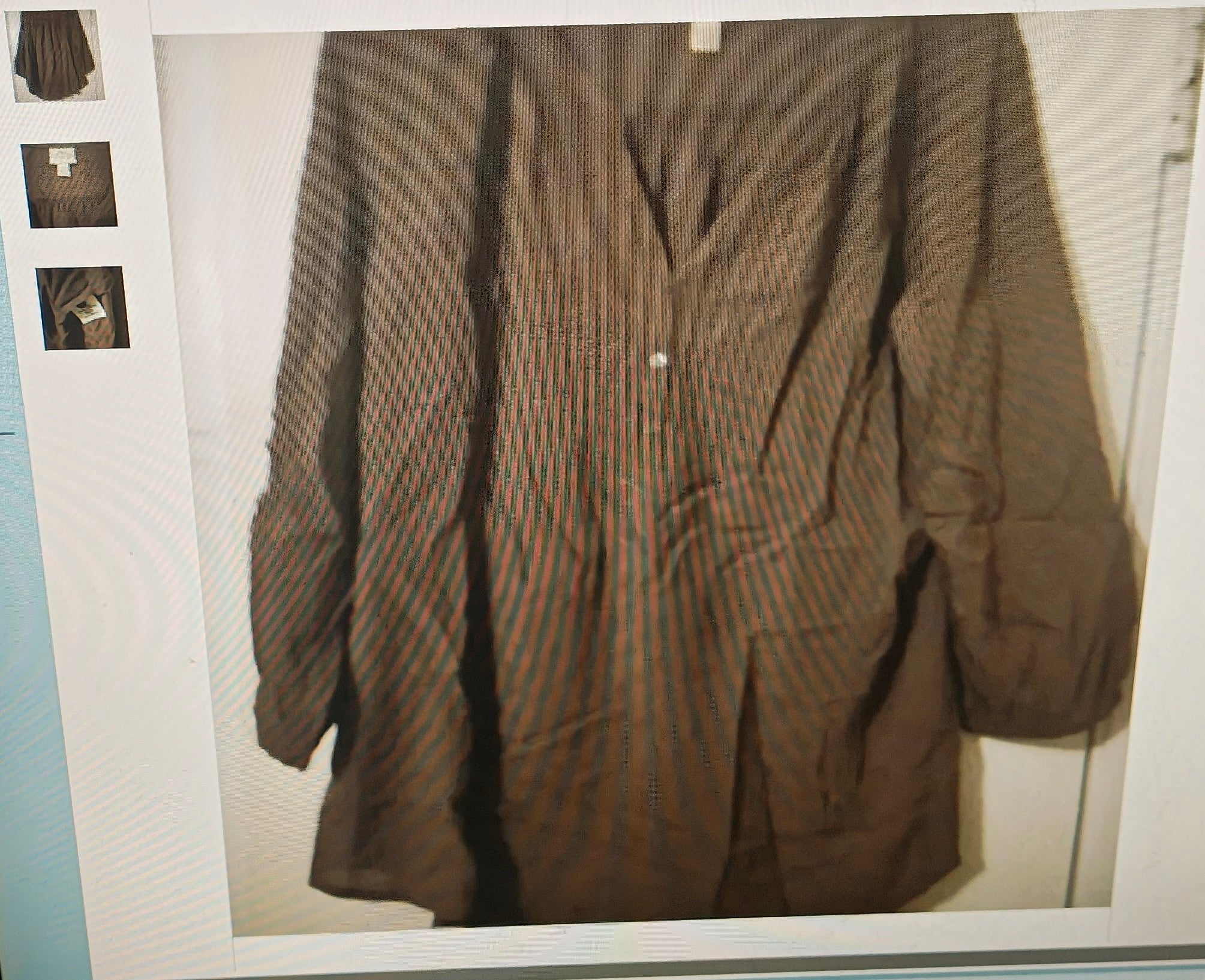 Brown coat with green stripes on a white background