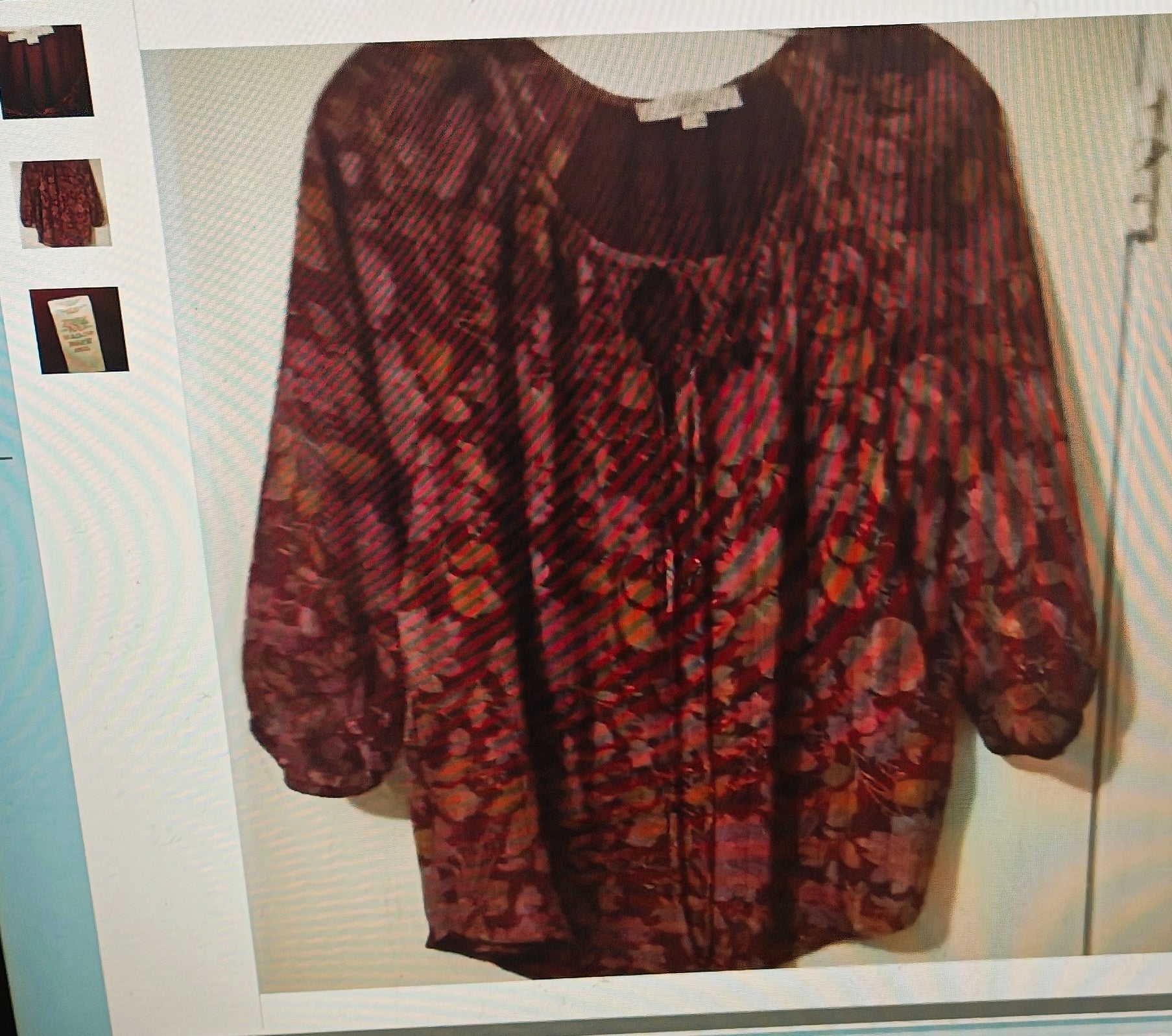 Red and brown patterned shirt on a white background