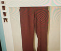 Maroon pants on a white background with a colorful border