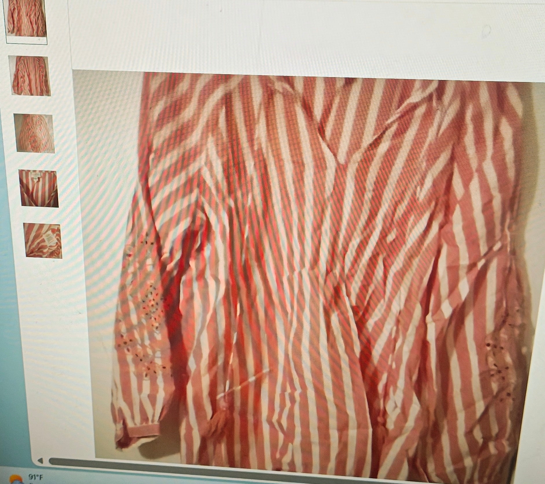 Striped shirt with red and white pattern on a light background