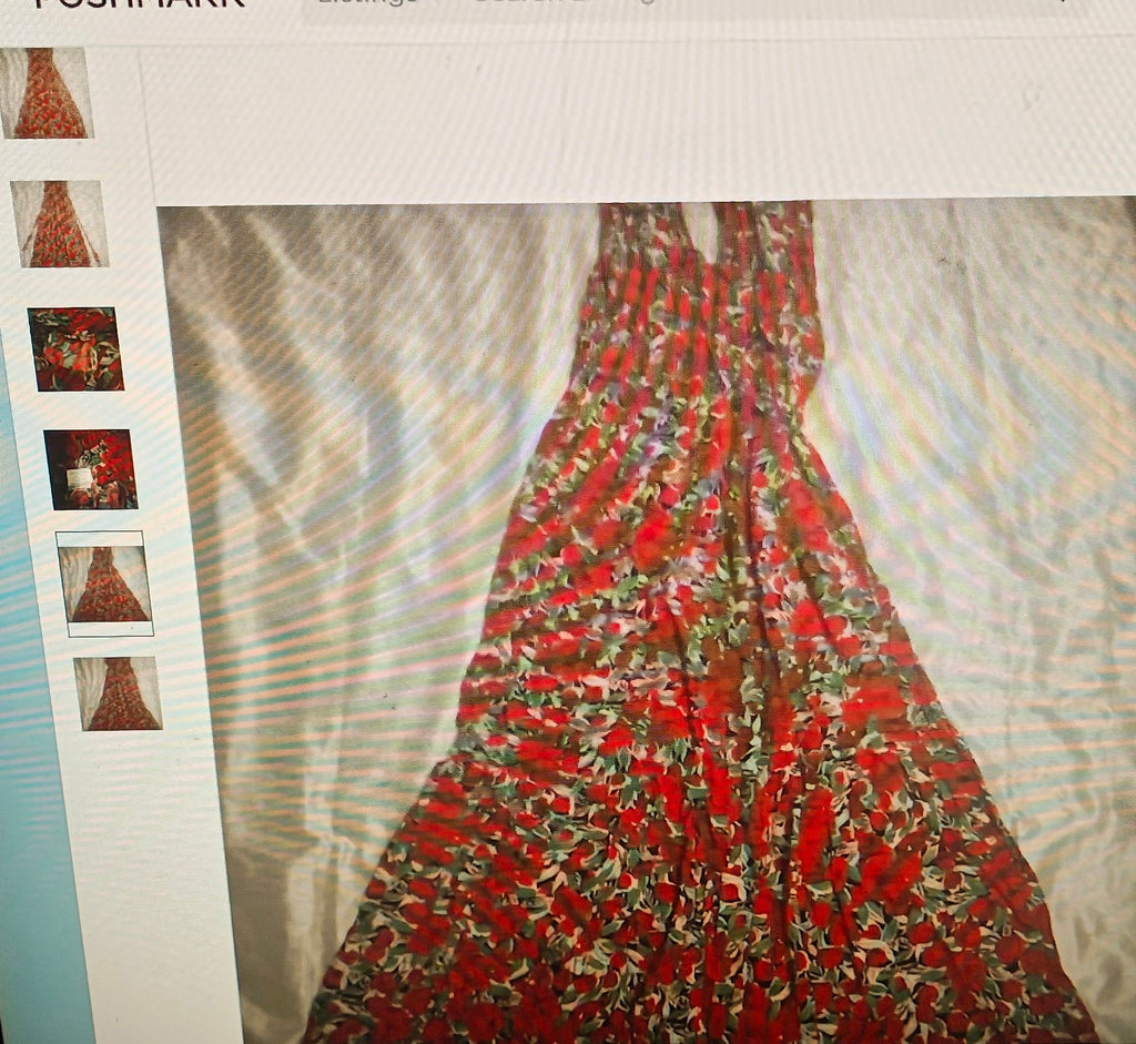 Red floral dress on a white background with Pinterest app interface.