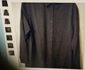 Dark gray button-up shirt on a hanger with a white background