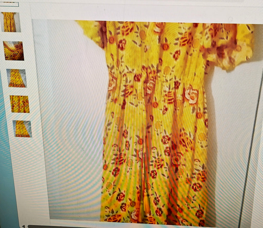 Yellow floral dress displayed on a mannequin with close-up insets on a light gray background