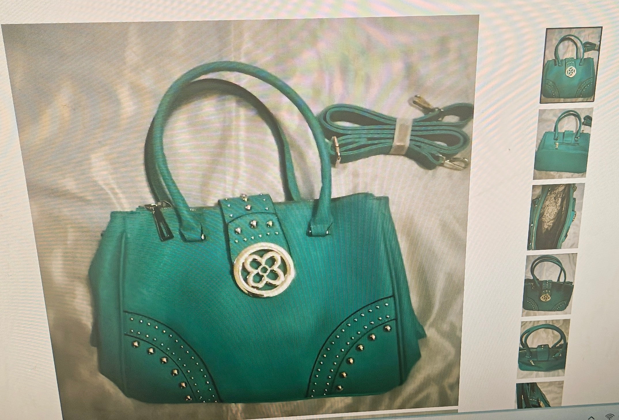Women's turquoise faux leather bag with handle and strap with gold tone metal
